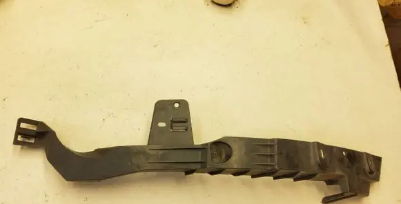Opel Astra J Front bumper mounting bracket 13287639