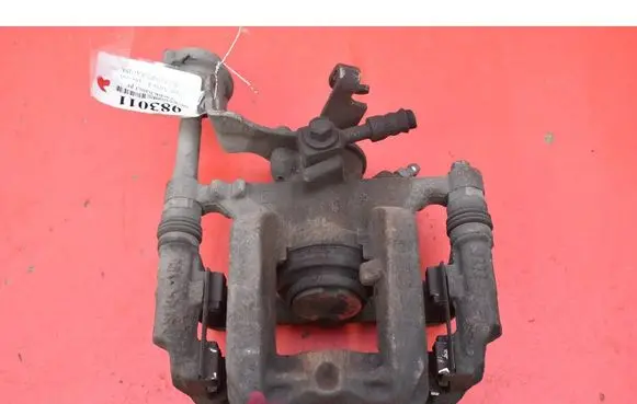 Opel Astra J Rear brake caliper
