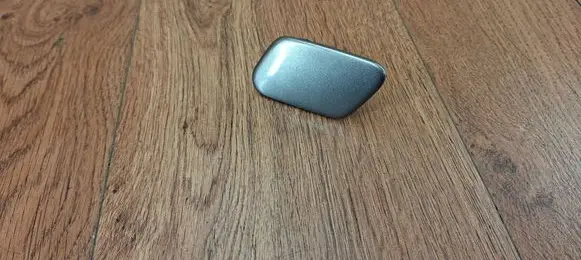 Headlight washer spray nozzle cap/cover
