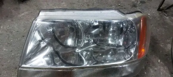 Jeep Grand Cherokee (WJ) Headlight/headlamp 61B50005093