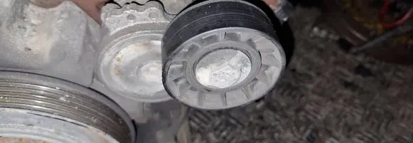 Generator/alternator belt tensioner