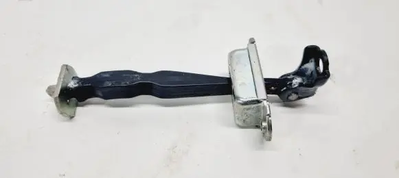 Rear door check strap stopper
