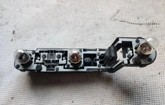 Volvo S70 V70 V70 XC Tail light bulb cover holder 149978