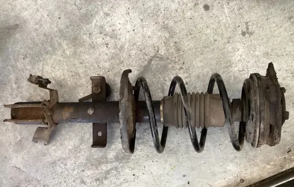 Renault Modus Front shock absorber with coil spring