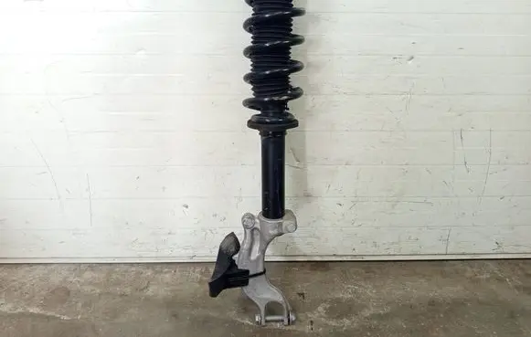 Front shock absorber with coil spring