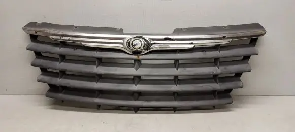 Chrysler Voyager Front bumper upper radiator grill 04857960AA