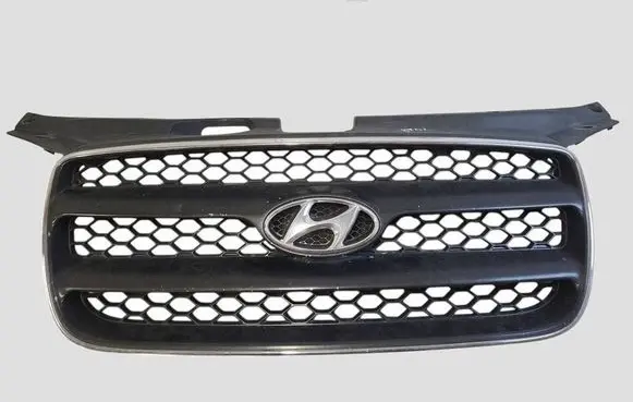 Hyundai Santa Fe Front bumper upper radiator grill 863532B000