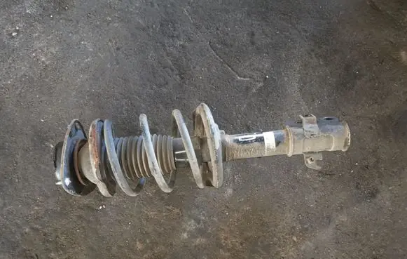 Subaru Forester SH Front shock absorber with coil spring