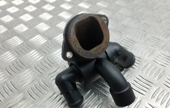 Thermostat/thermostat housing