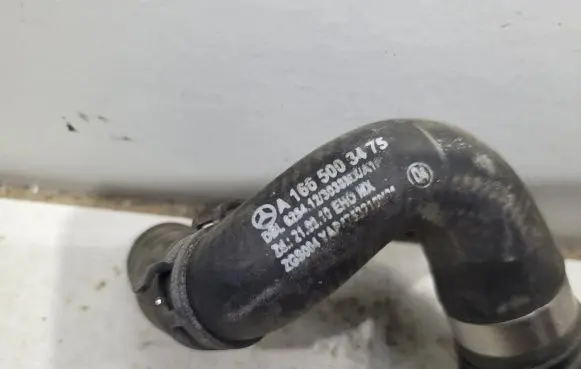 Mercedes-Benz GL X166 Engine coolant pipe/hose A1665003475