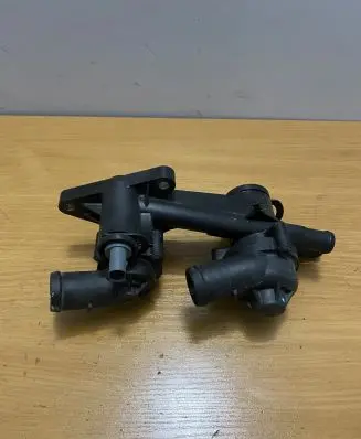 Thermostat/thermostat housing
