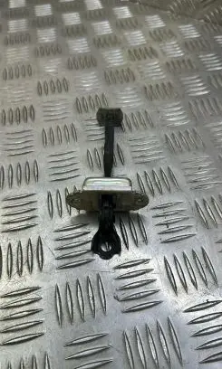 Nissan Pulsar Front door check strap stopper