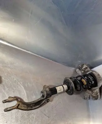 Front shock absorber with coil spring