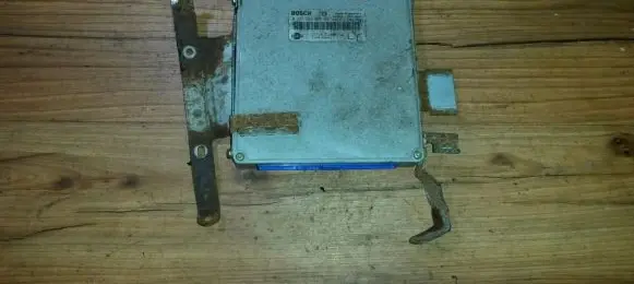 Nissan Primera Engine control unit/module 0261203855 237103j400