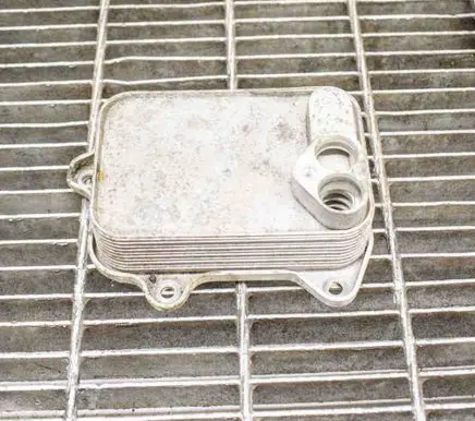 Audi A3 S3 8P Engine oil radiator 03C115111D 03C117021E