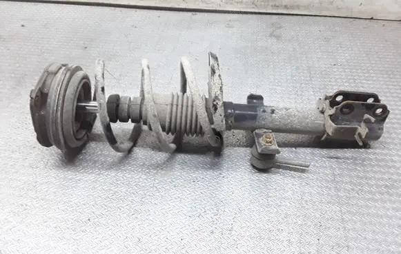 Renault Clio III Front shock absorber with coil spring