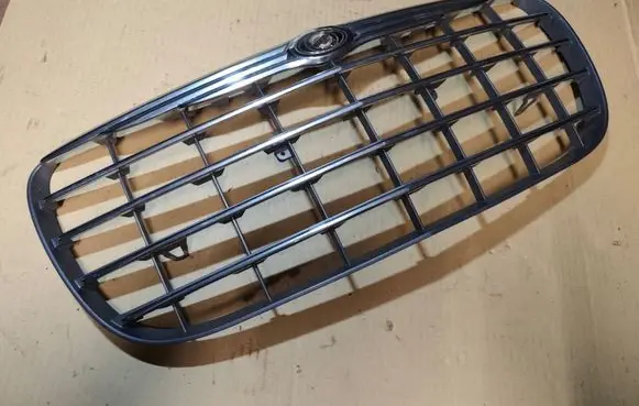 Chrysler Sebring (ST-22 - JR) Front bumper upper radiator grill 04805893AB