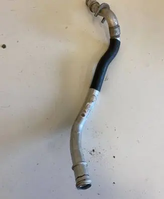 Volkswagen Touareg II Engine coolant pipe/hose 7P0819857C