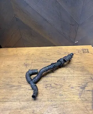 Engine coolant pipe/hose