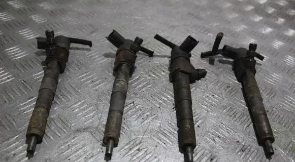 Opel Astra J Fuel injector 0445110327