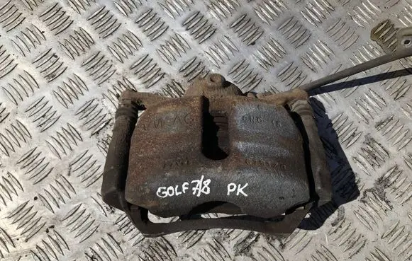 Volkswagen Golf VII Front brake caliper