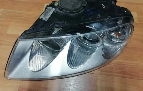 Volkswagen Touareg I Headlight/headlamp 7L6941015CG 89308471
