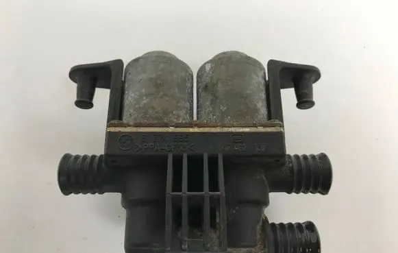 Coolant heater control valve