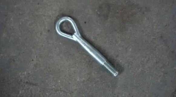 Towing hook eye