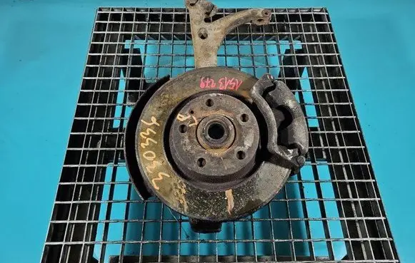 Front wheel hub spindle knuckle
