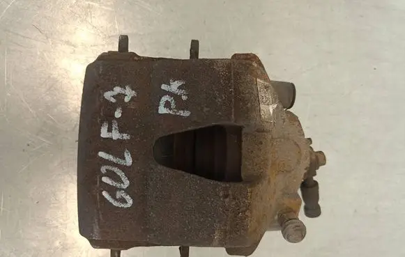 Volkswagen Golf VII Front brake caliper