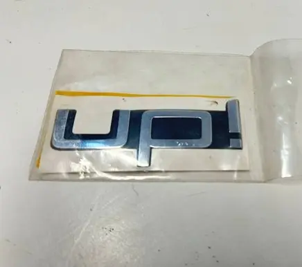 Volkswagen e-Up Manufacturers badge/model letters 1S6853687
