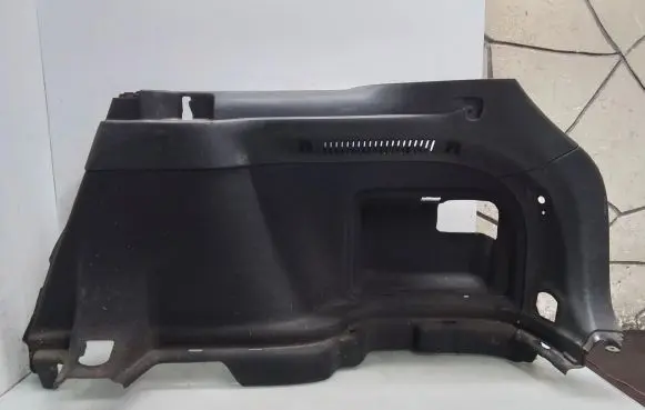 Trunk/boot lower side trim panel