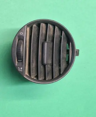 Volkswagen Caddy Dash center air vent grill 2K0819703B