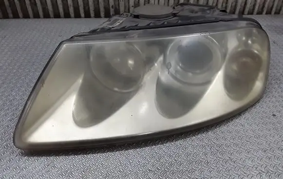 Volkswagen Touareg I Headlight/headlamp 7L6941015BJ