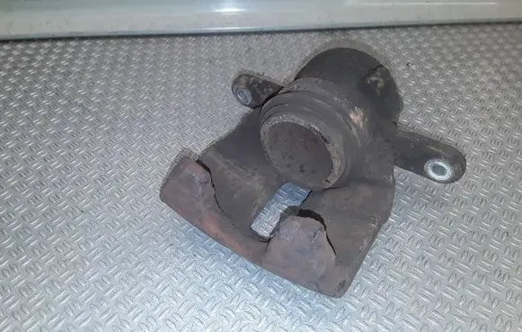 Renault Clio III Front brake caliper 