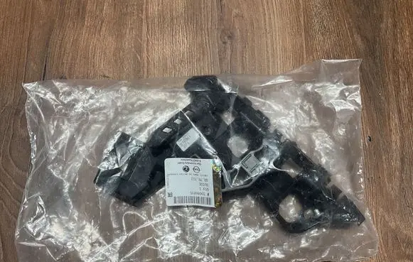 Opel Astra K Front bumper mounting bracket 39086895 GR78312