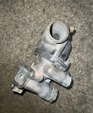 Thermostat/thermostat housing