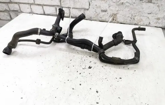 Volkswagen Touran II Engine coolant pipe/hose 1K0122101KN 03L121131AA