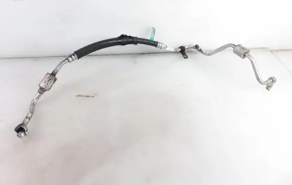 Suzuki Swift I Air conditioning (A/C) pipe/hose 9571062JB0