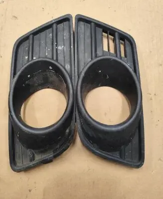 Suzuki Swift I Front fog light trim/grill 7176172KIL