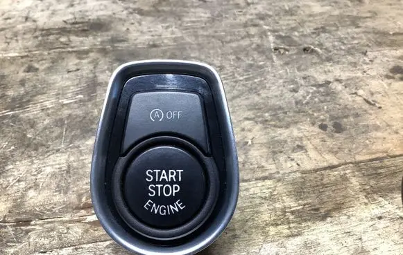 Engine start stop button switch