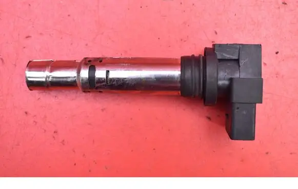 Volkswagen Golf V High voltage ignition coil 036905715
