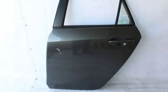 Mazda 3 II Rear door 2009R