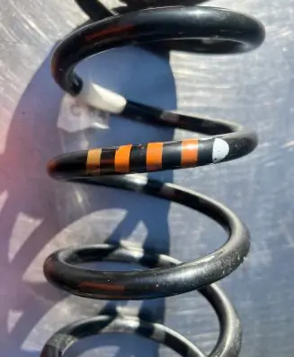 Volkswagen Touran I Front coil spring rubber mount 1K0512297