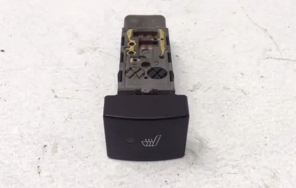 KIA Carens I Seat heating switch
