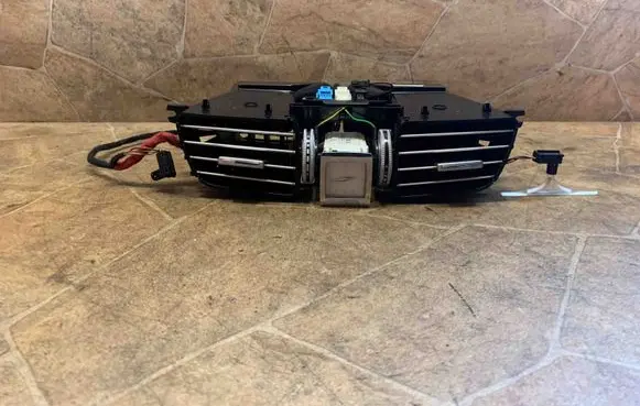 Dash center air vent grill