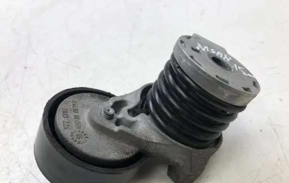 Nissan Qashqai Alternator belt tensioner 6563010