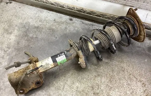 Mitsubishi Colt CZ3 Front shock absorber with coil spring 801402000090 824902000482