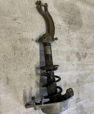 Front shock absorber with coil spring