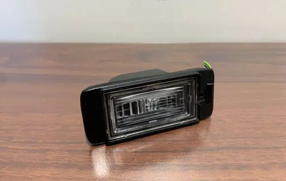 Opel Zafira C Number plate light 13578958
